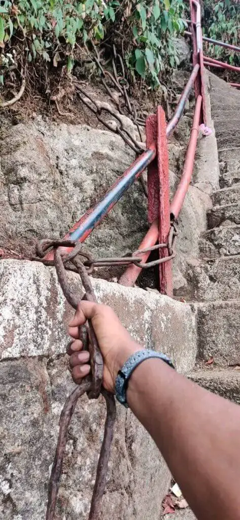 Ancient iron chains on Sri Pada trail appearing strong and sturdy for pilgrims.