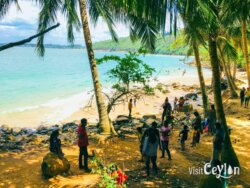 Crowded Mini Jungle Beach, Sri Lanka. Photo by Sameera Marapperuma Crowded Mini Jungle Beach in Sri Lanka with tourists enjoying the beach.