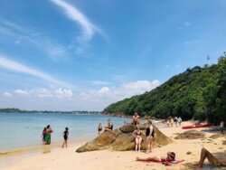 Foreigners relaxing at Jungle Beach, Sri Lanka. Photo by Vindya Foreigners relaxing at Jungle Beach in Sri Lanka.