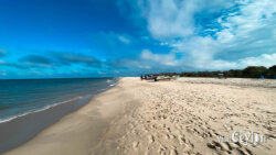 Baththalangunduwa Beach – Photo by Sameera Marapperuma Baththalangunduwa Beach with clear blue water, white sand, and peaceful island scenery.
