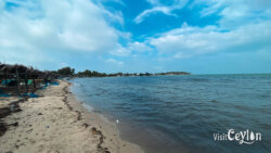 Baththalangunduwa Island jetty area – Photo by Sameera Marapperuma etty area of Baththalangunduwa Island with boats and calm waters.
