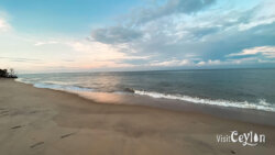 Sunset view at Baththalangunduwa Beach – Photo by Sameera Marapperuma Sunset view at Baththalangunduwa Beach with golden sky and calm ocean waves.