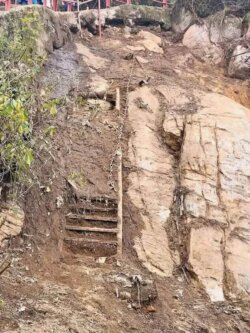 Ancient iron steps and chains of Sri Pada visible after a landslide Ancient iron steps and chains of Sri Pada exposed after a recent landslide.
