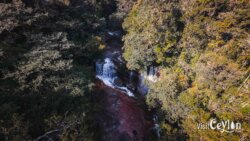 Paradise Falls from above – Photo by Sameera Marapperuma View of Paradise Falls from above, showing water cascading into the pool below.